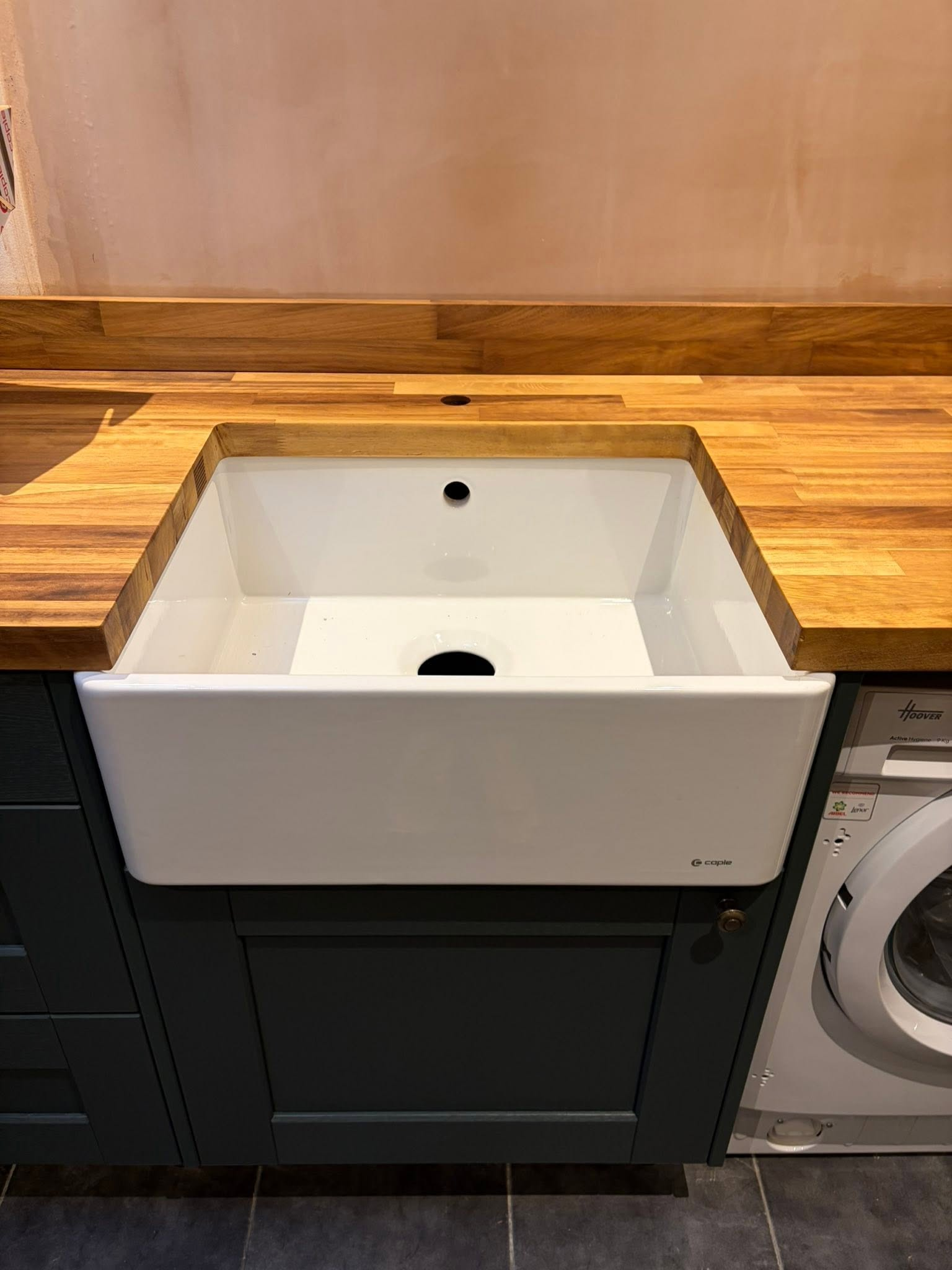 Belfast sink fitted into a wooden worktop