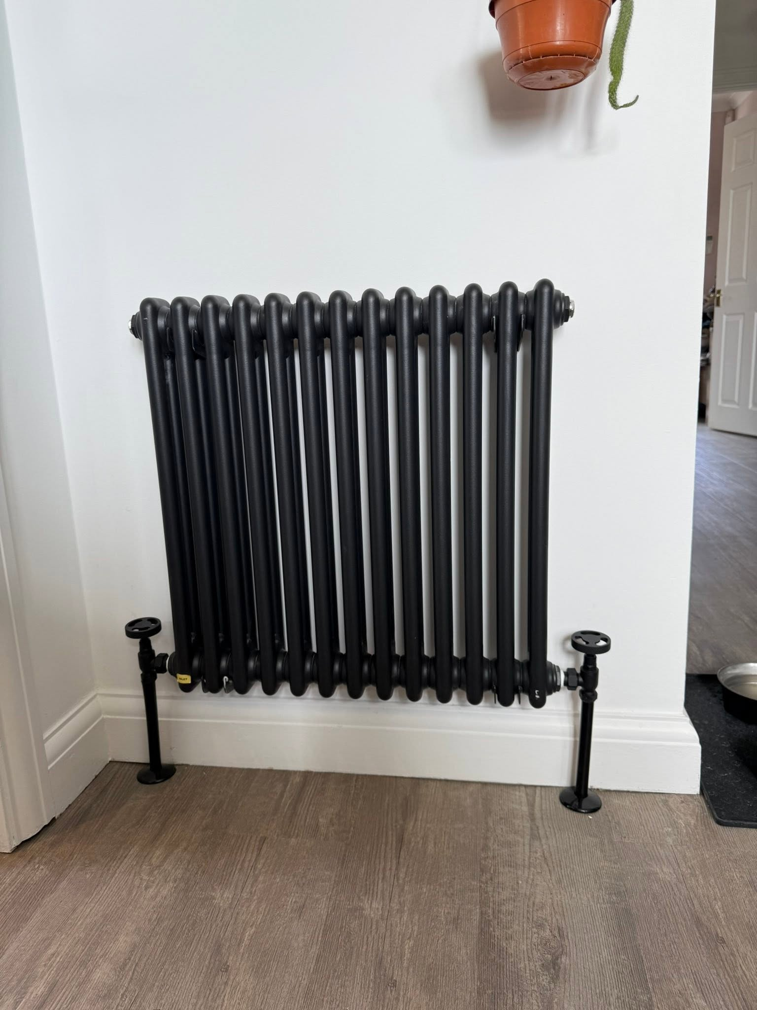 Black traditional radiator installation